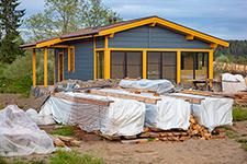 В России снизилась стоимость строительства частных домов. В чем