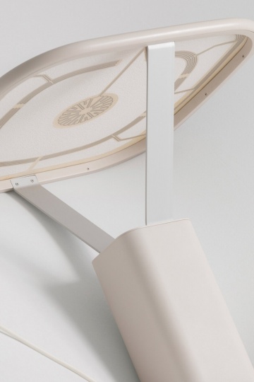 WINT Design Lab придумала лампу, яркость которой меняется за счет движения жидкого металла